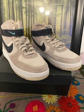Nike Air Force Beige High-Top Sneakers with Blue Swoosh and Teal Accents